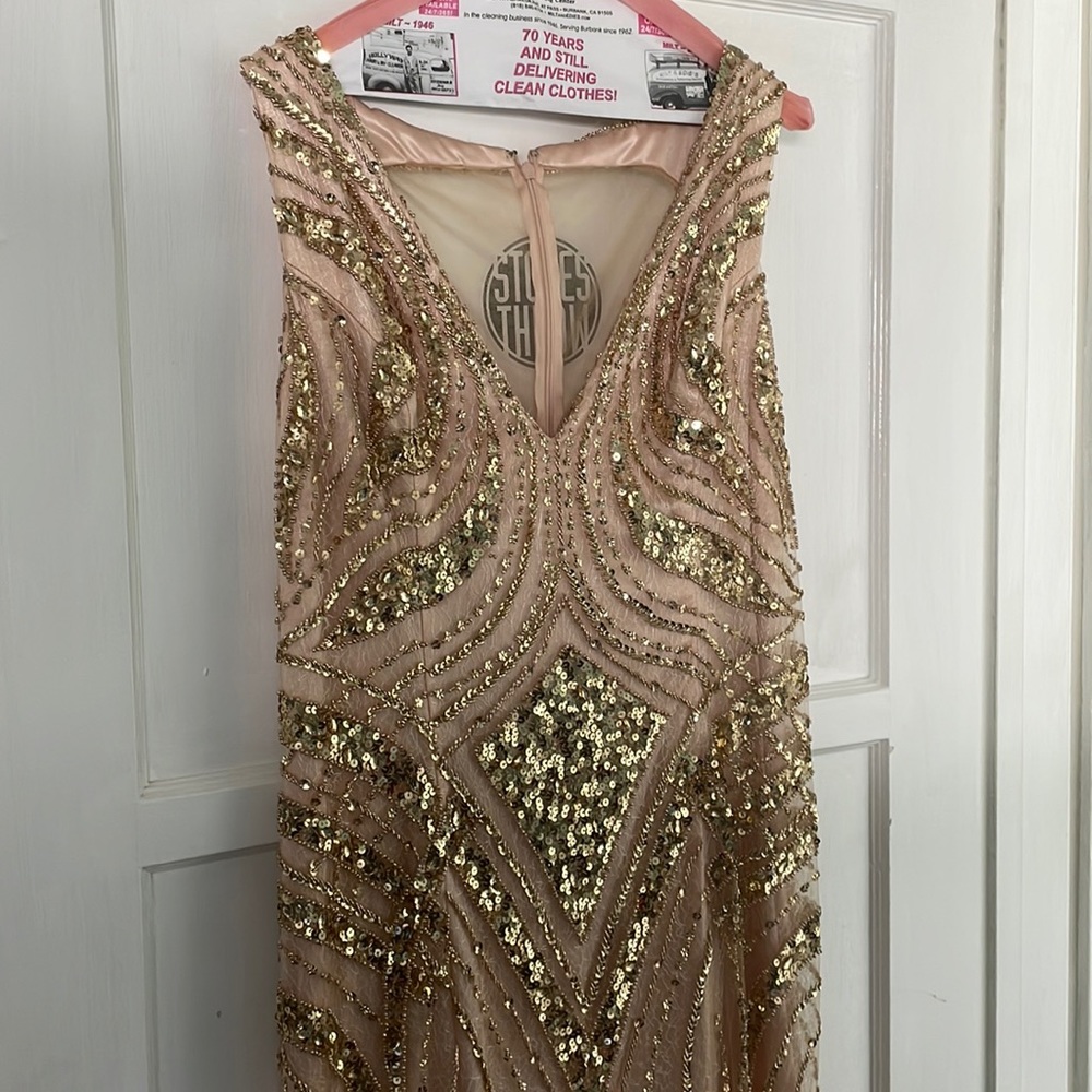 Rose gold, sequined floral gown with mini train